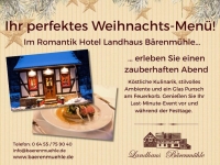 Kerzenlicht und Kaminfeuer sorgen in der Bärenmühle für winterliche Gemütlichkeit.